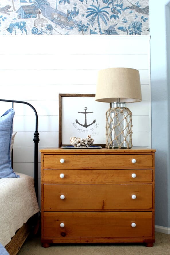 Mixing blues, vintage pieces and coastal accents is a fun way to bring in a coastal cottage feel to your bedroom!