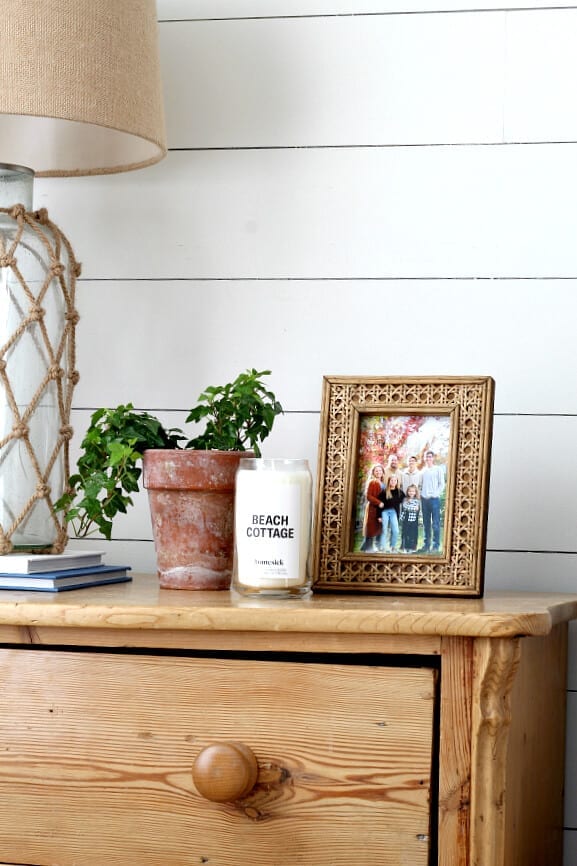 Our coastal cottage master bedroom makeover has several fun and personal touches that give it that beachy style.