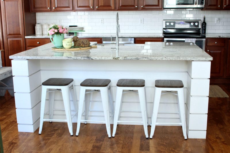 White shiplap kitchen island ready for spring