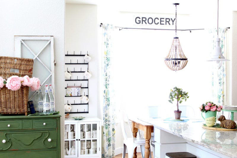 Greens and pinks in a colorful cottage Spring kitchen.