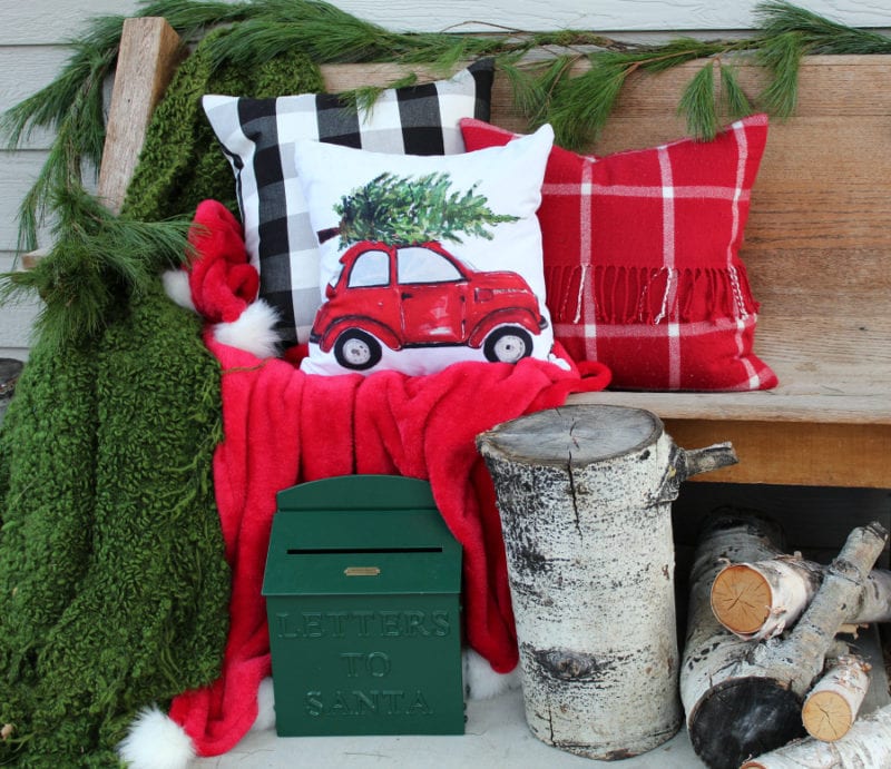 A cozy Christmas porch that brings the holidays to life!