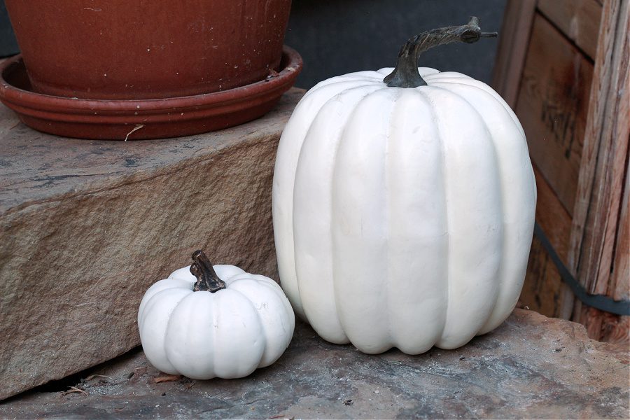 White faux pumpkins are a staple in my Fall porch decor.