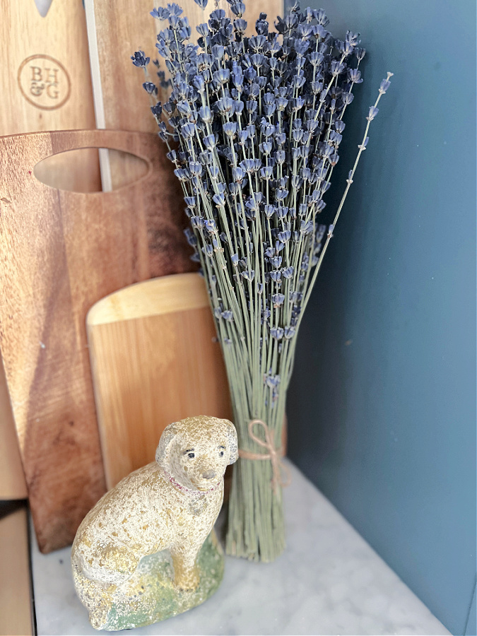 dried lavender flowers in front of cutting board
