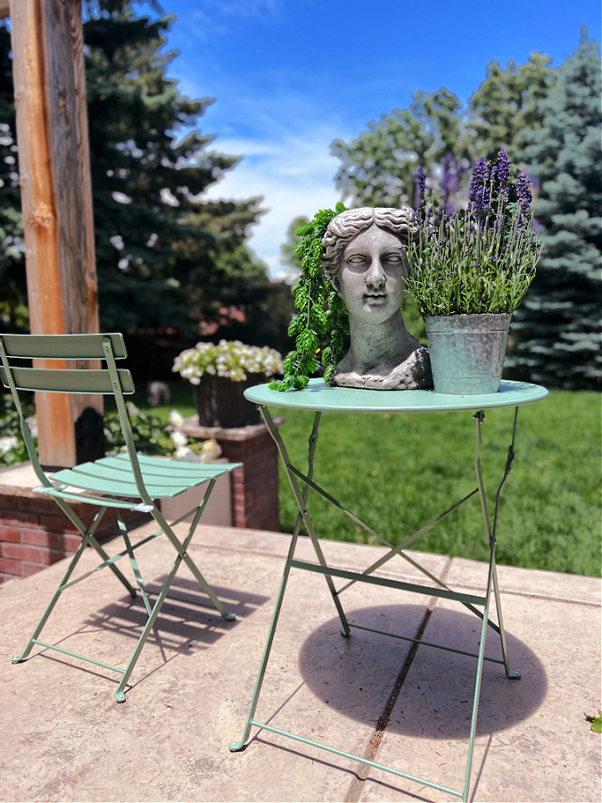 Lavender in a metal bucket on a bistro table