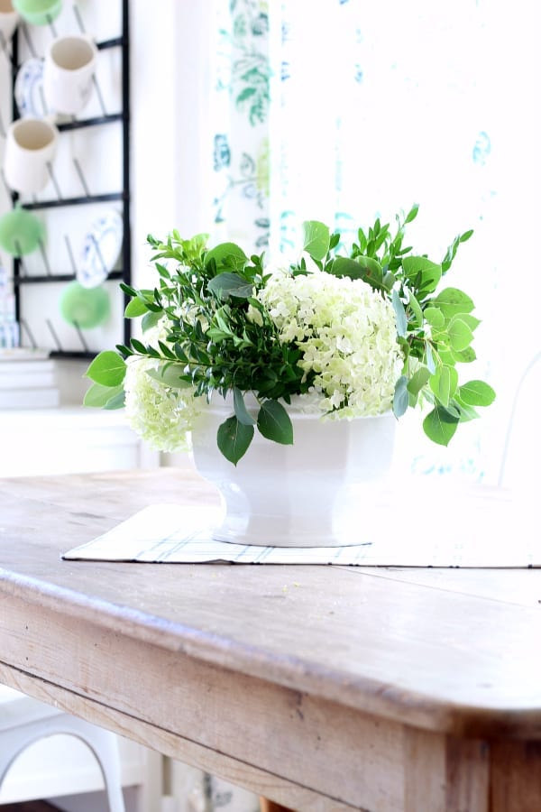 Learn how to make a low hydrangea centerpiece.