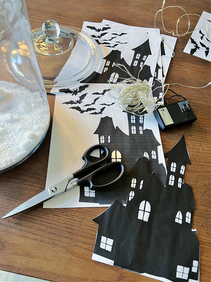 All the supplies needed for an easy haunted house silhouette craft!