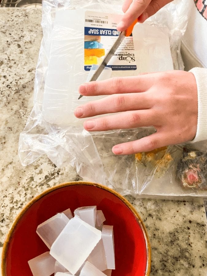 Preparing the glycerin to make homemade soaps for Christmas gifts.