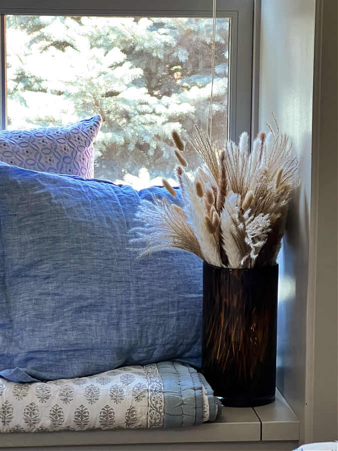 blue pillow and fall grasses