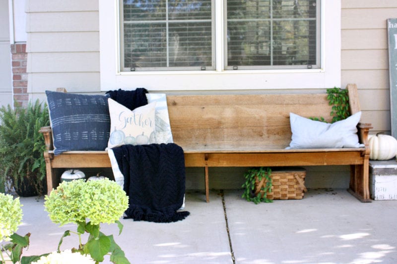 Our porch is ready for Fall and full of blue accents and pillows.