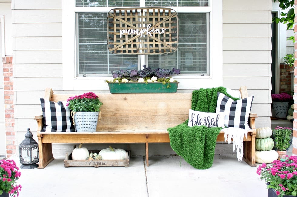 A porch full of vintage, thrifted and new decor. Tips on how to mix them seamlessly into your decor.