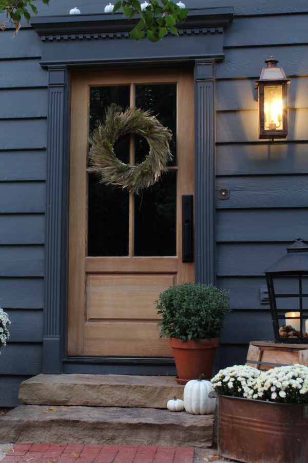 Our front steps and wood door decorated for Fall.