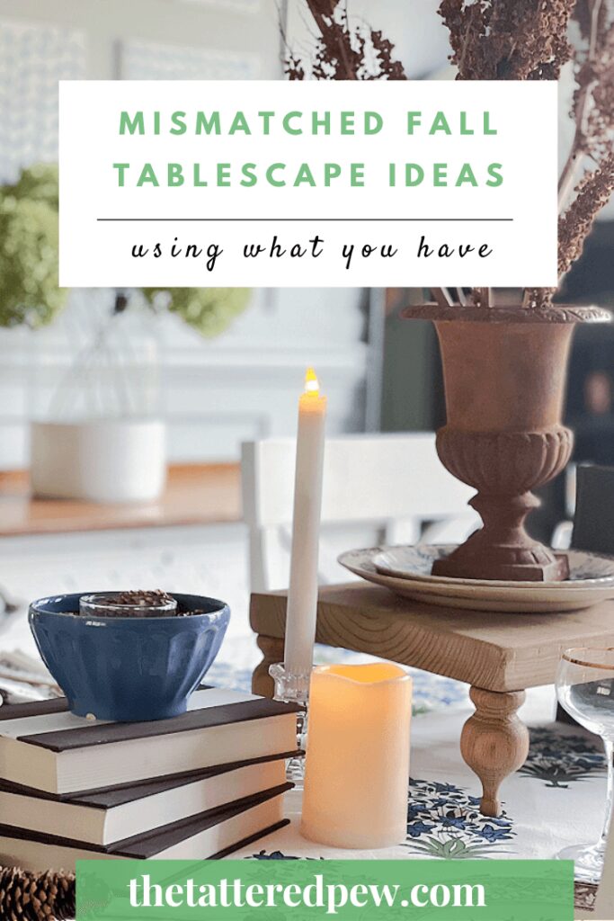 Fall tablescap ideas showing candle, books and flowers