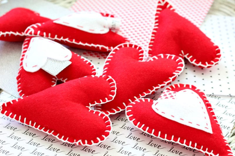 red felted heart pillows with love notes
