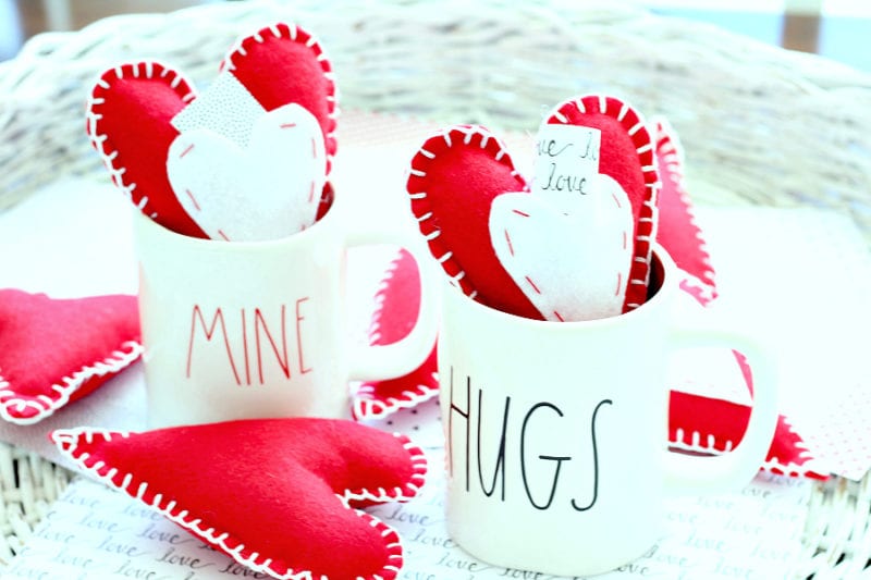 heart pillows in mugs
