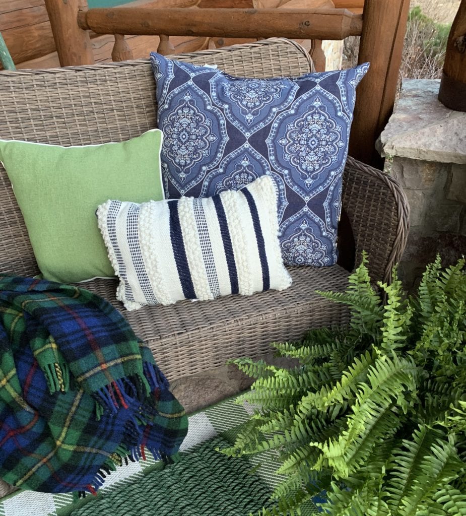 Spring cottage porch with blues and greens.