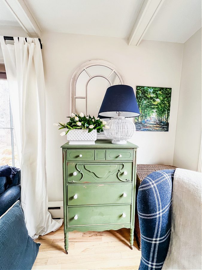 My favorite boxwood green dresser in a fun corner of our family room.