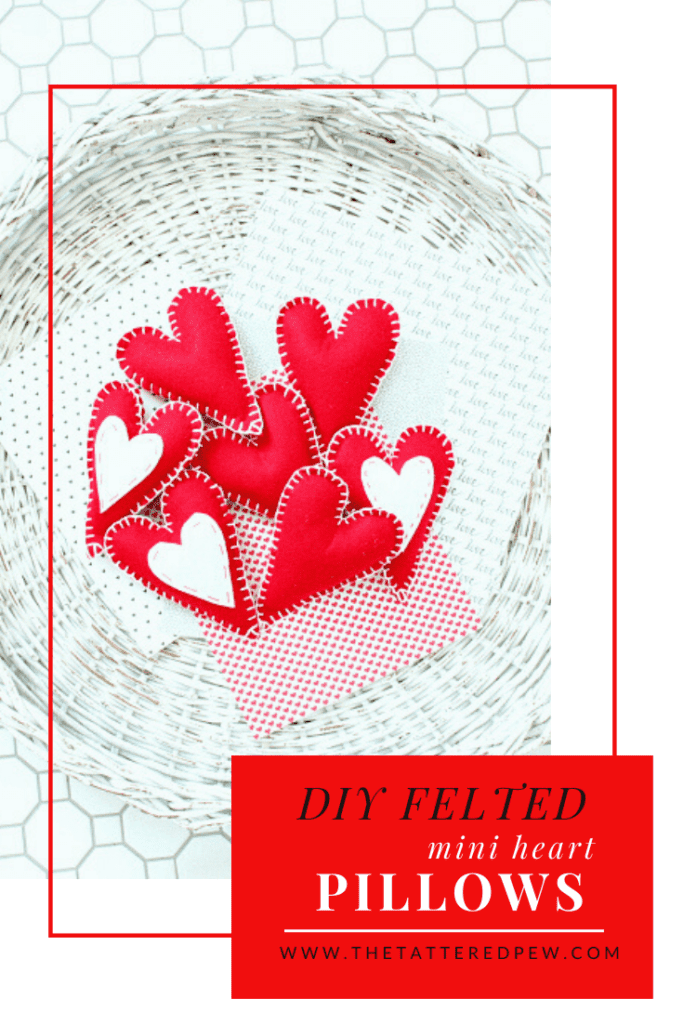 Make these darling mini DIY felted heart pillows with pockets for love notes!