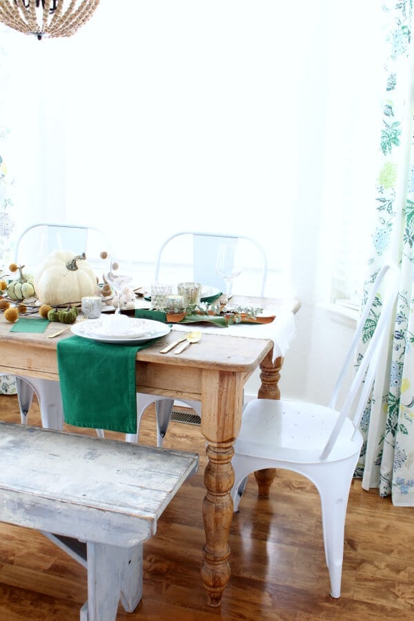 Our kitchen nook and weathered old table create the prefect setting for a cozy Thanksgiving table.