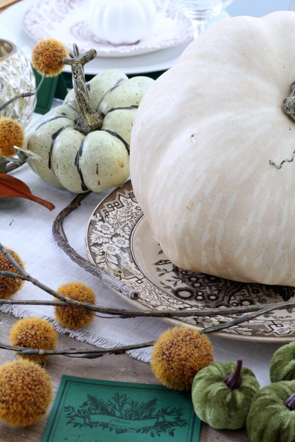 Mixing faux and real elements on your table gives it a welcoming and cozy feel!