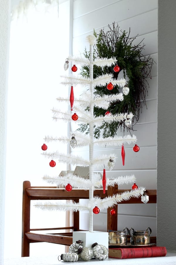 Vintage SHiny Brite ornaments adorn a beautiful feather tree and add such lovely charm.