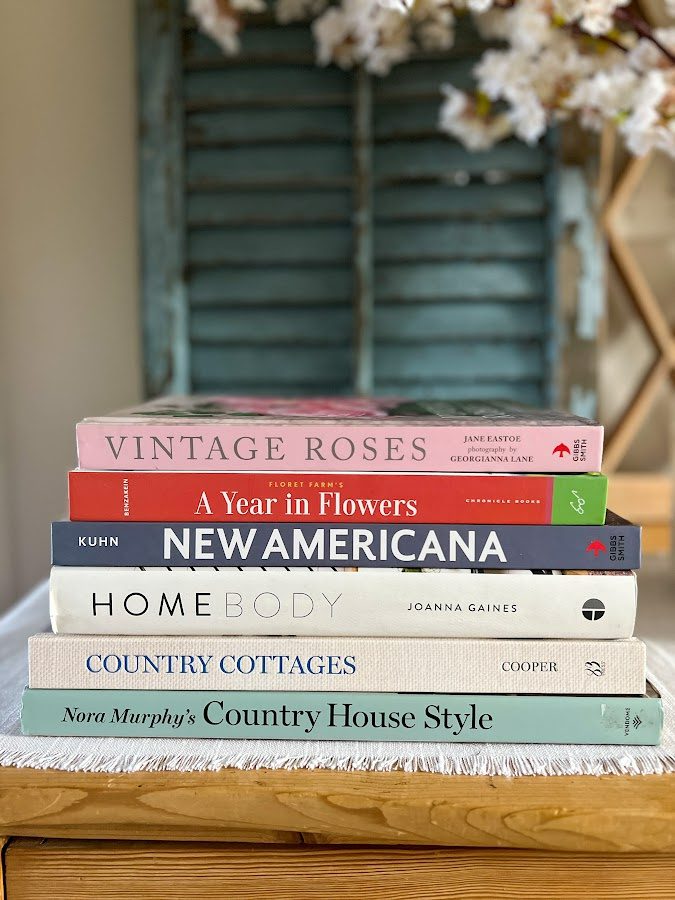 A stack of my favorite home decor and flower books.