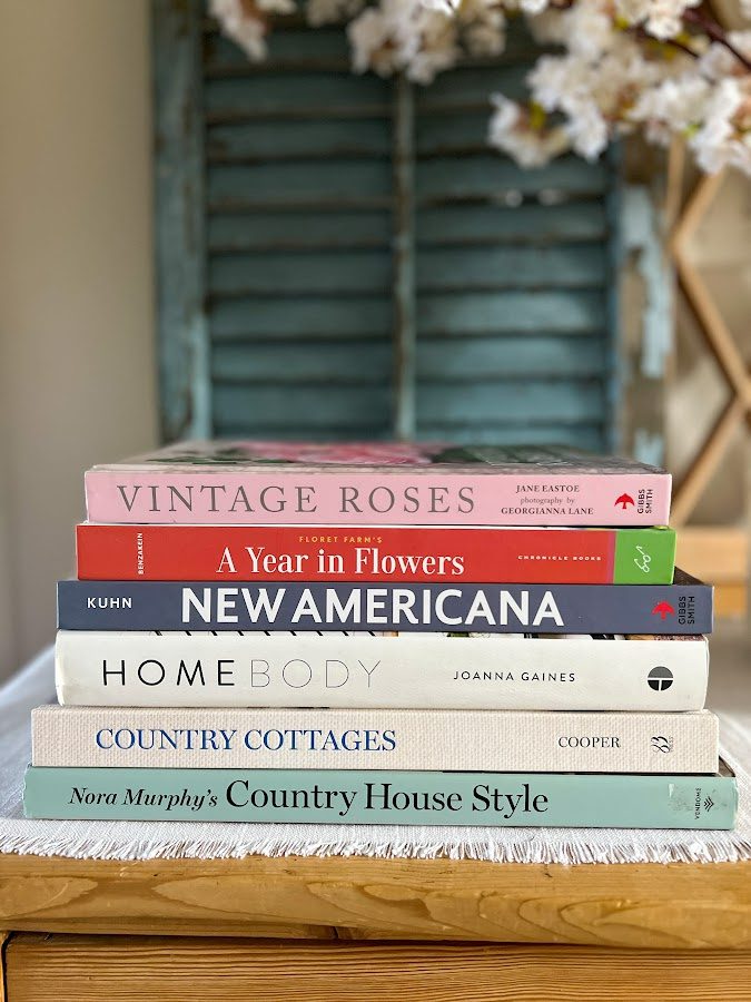 A stack of my favorite home decor and flower books.