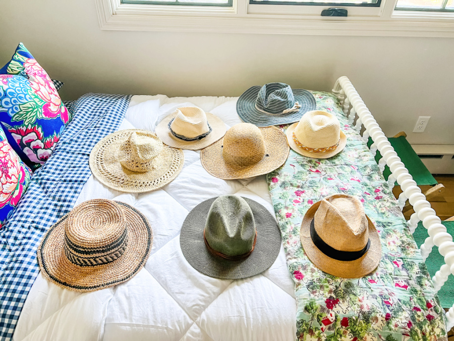 Laying out my hats before I hang them up on the wall.