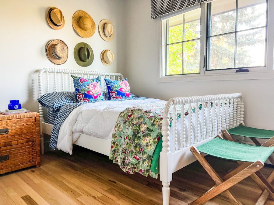 Guest bedroom with hat wall display!