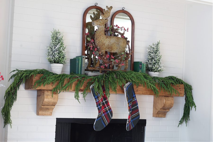 This faux garland is the best and makes this rustic mantel stand out at Christmas!