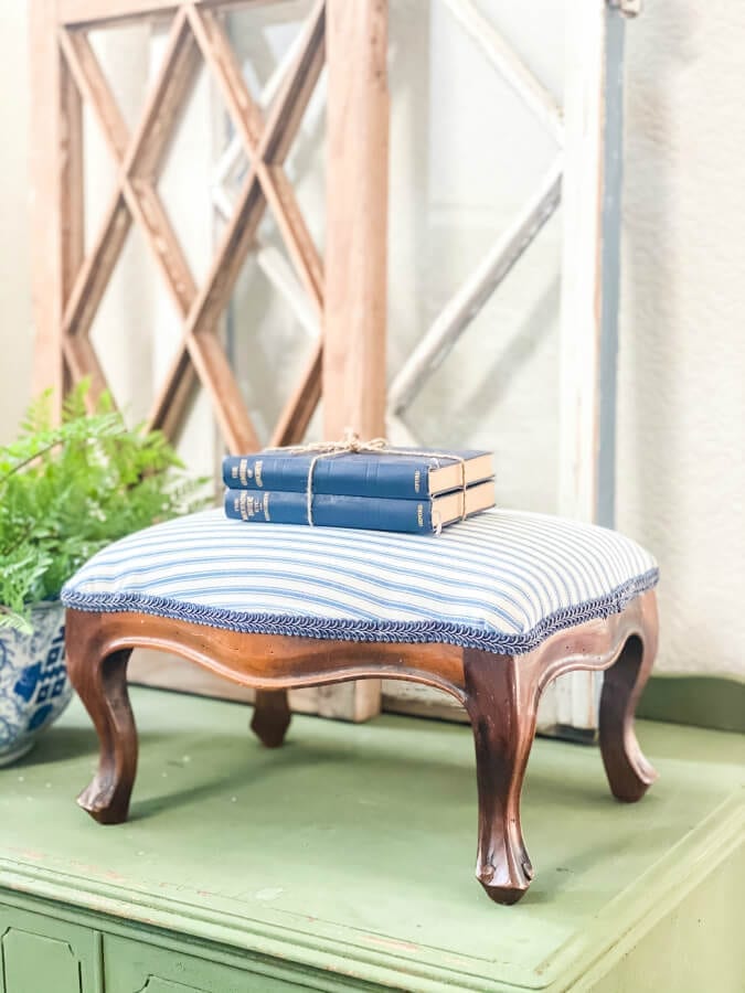 This vintage footstool gets a simple and quick makeover .