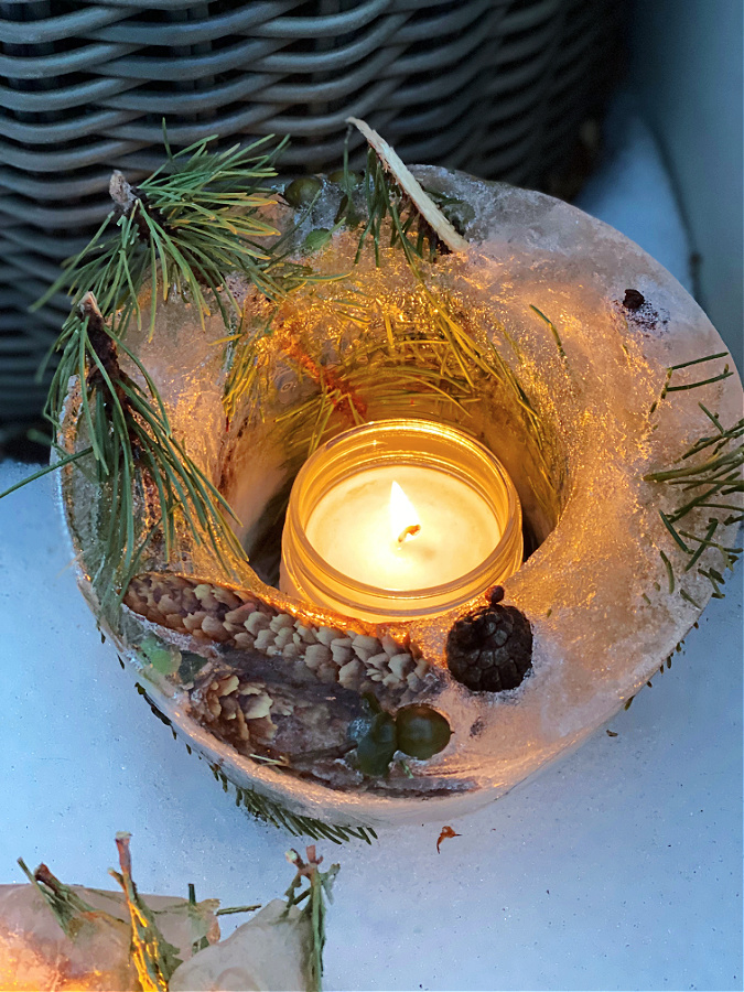 The glow of an ice votive in the snow is winter perfection!