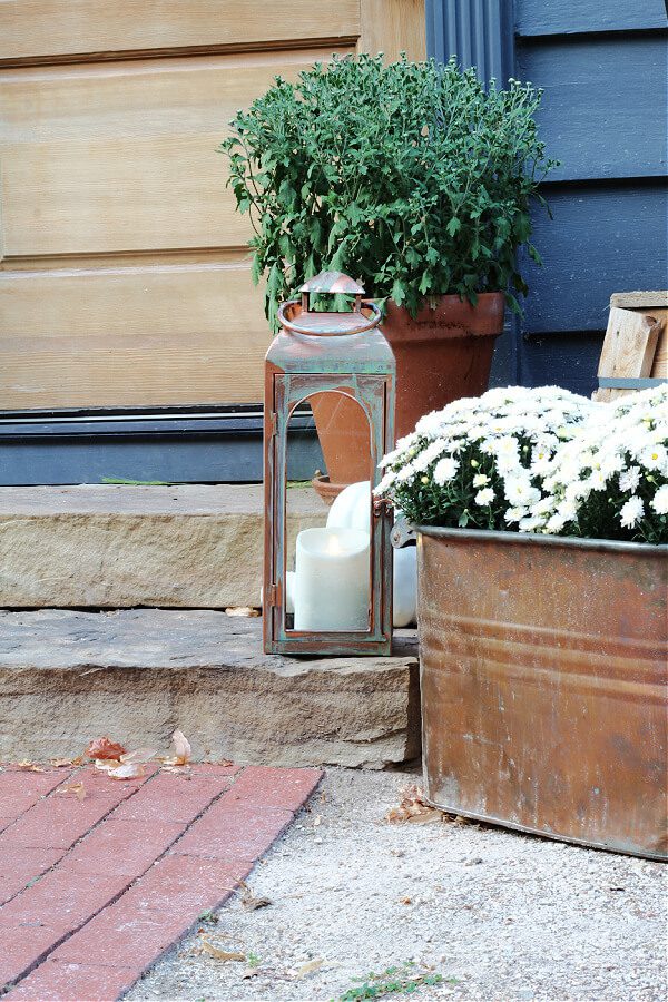 Fall front steps with copper accents and white mums