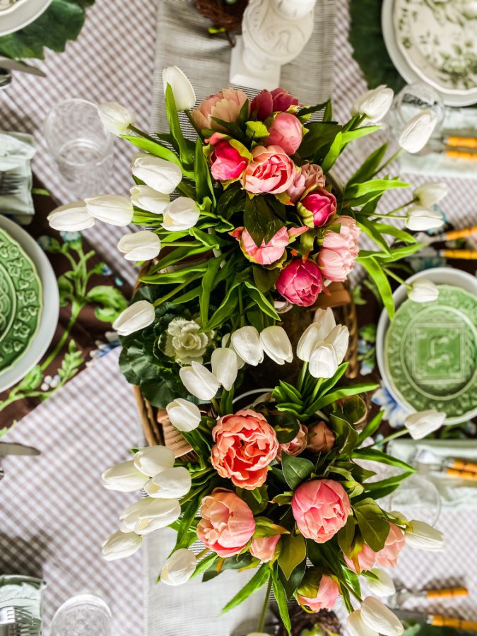 Faux pink peonies and faux white tulips make this Easter centerpiece pop!