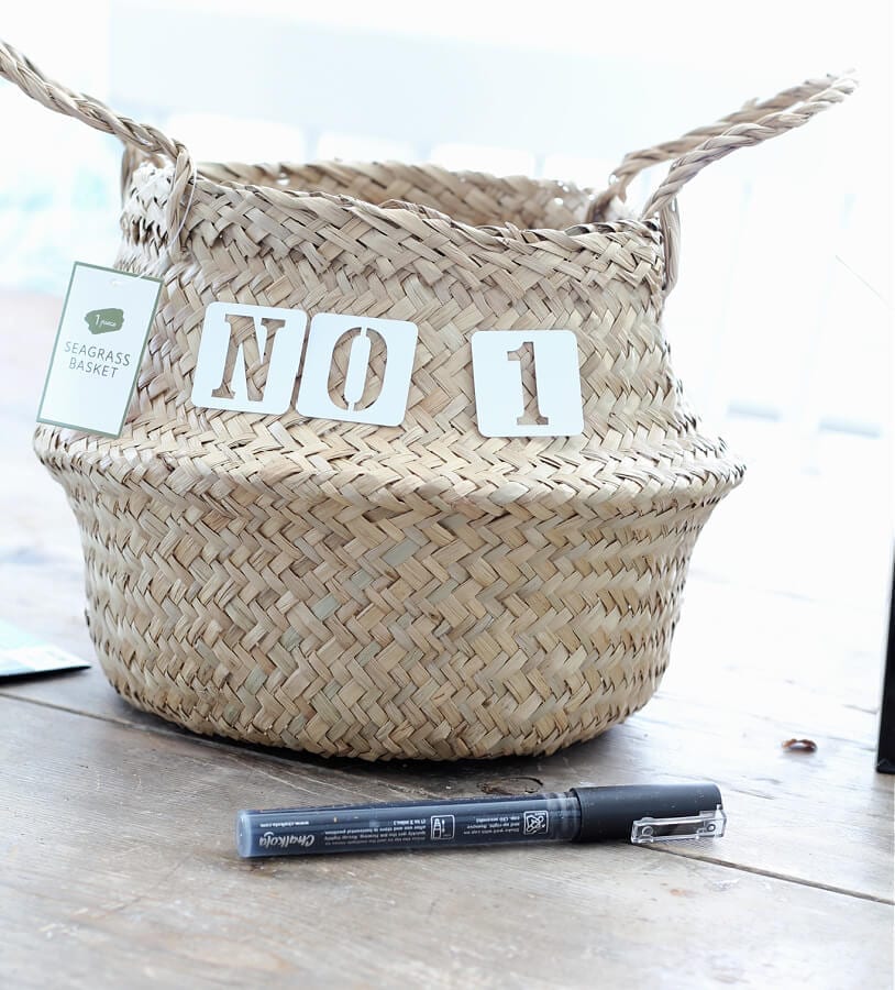 Using paint pens to stencil a sea grass basket from Target