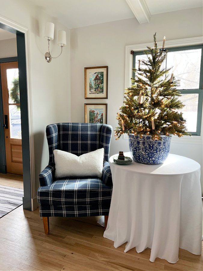 blue plaid chair and tabletop tree