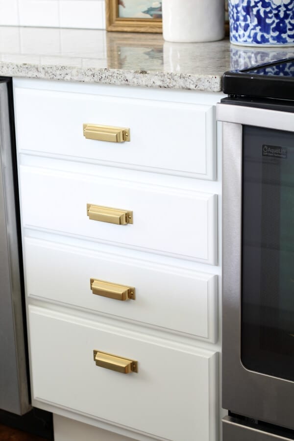 Rejuvenation hardware in aged brass was the finishing touch to our newly refinished cabinets!