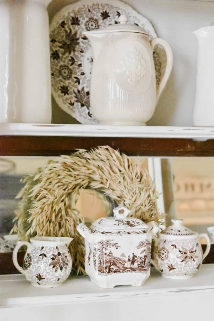 Do you have trouble styling your china cabinet or kitchen hutch?  I have some easy step by step ideas on how to decorate you hutch with layers that add uniqueness and interest. Vintage Home Designs