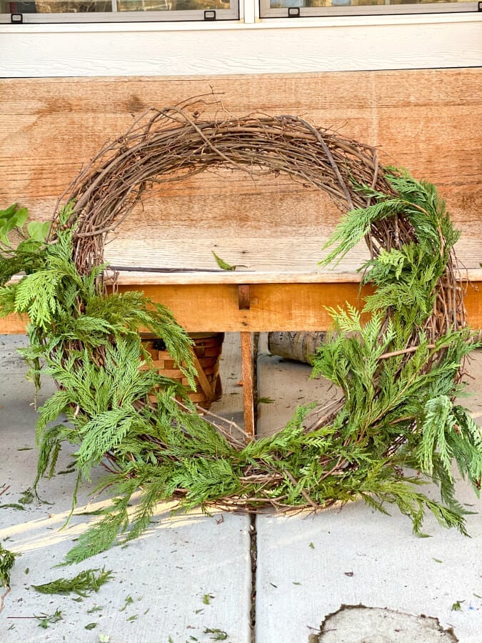 How to make a large outdoor Christmas wreath with items you already have.