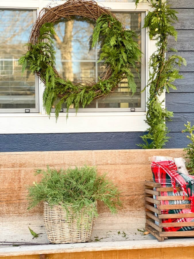 THe beginnings of a large outdoor Christmas wreath perfect for your porch!