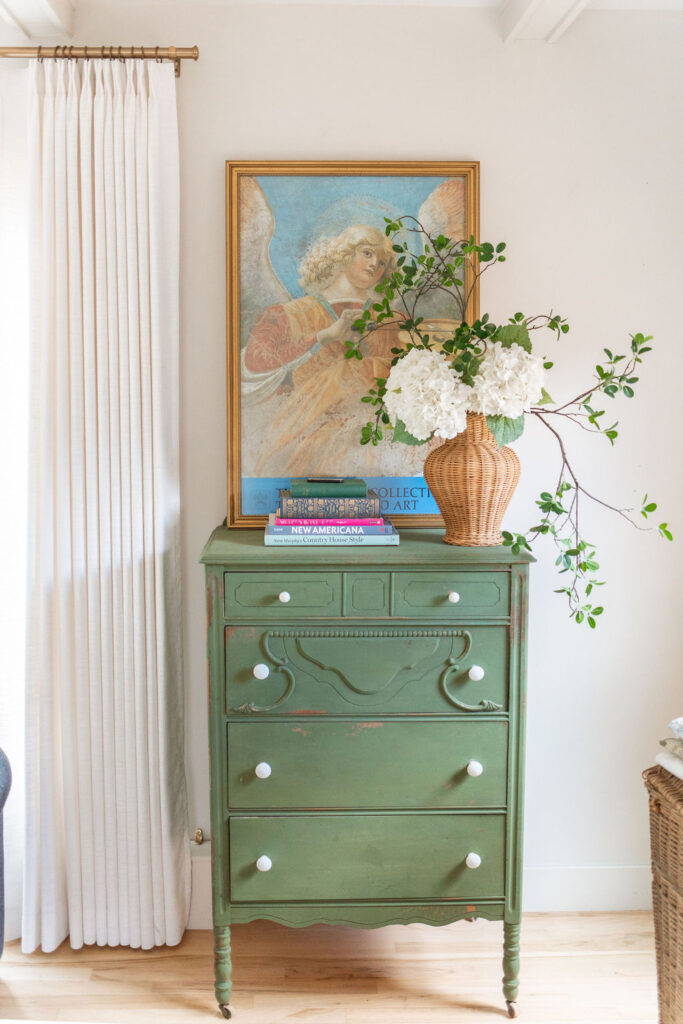 green dresser with hydrangeas and greens