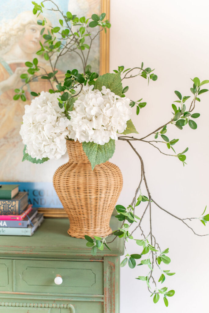 faux greens and faux white hydrangeas