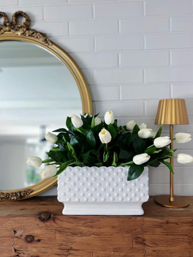 mantel with hobnail planter and tulips