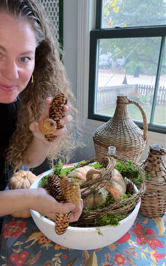 Adding more pinecones to my simple fall centerpiece