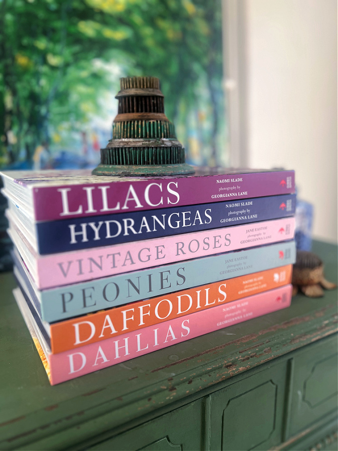 a stack of floral books