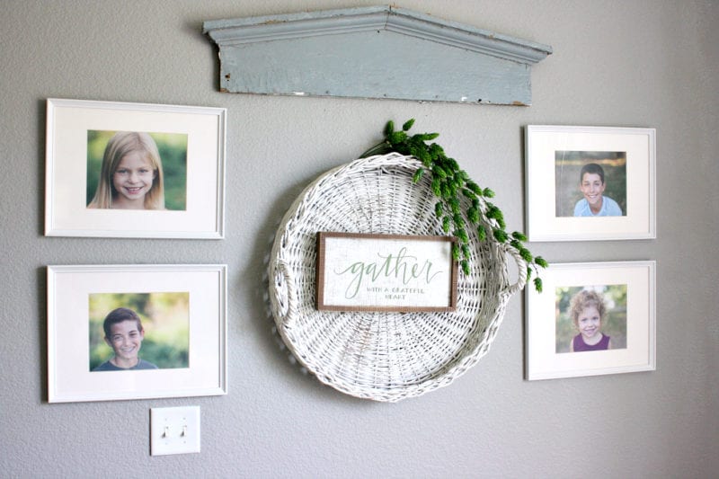 This round basket is ready for fall with this neutral gather sign and green barley.