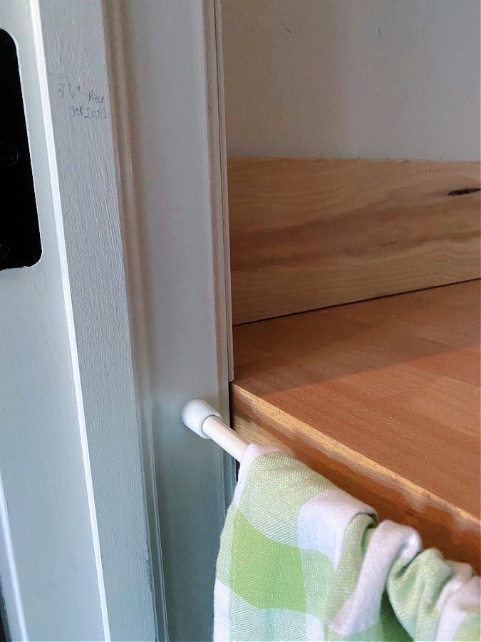 tension rod curtain in pantry