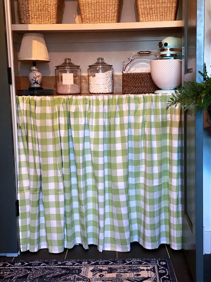 Buffalo check tablecloth used for a pantry skirt.