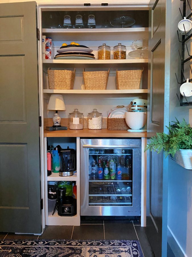 Pantry with drink fridge and storage