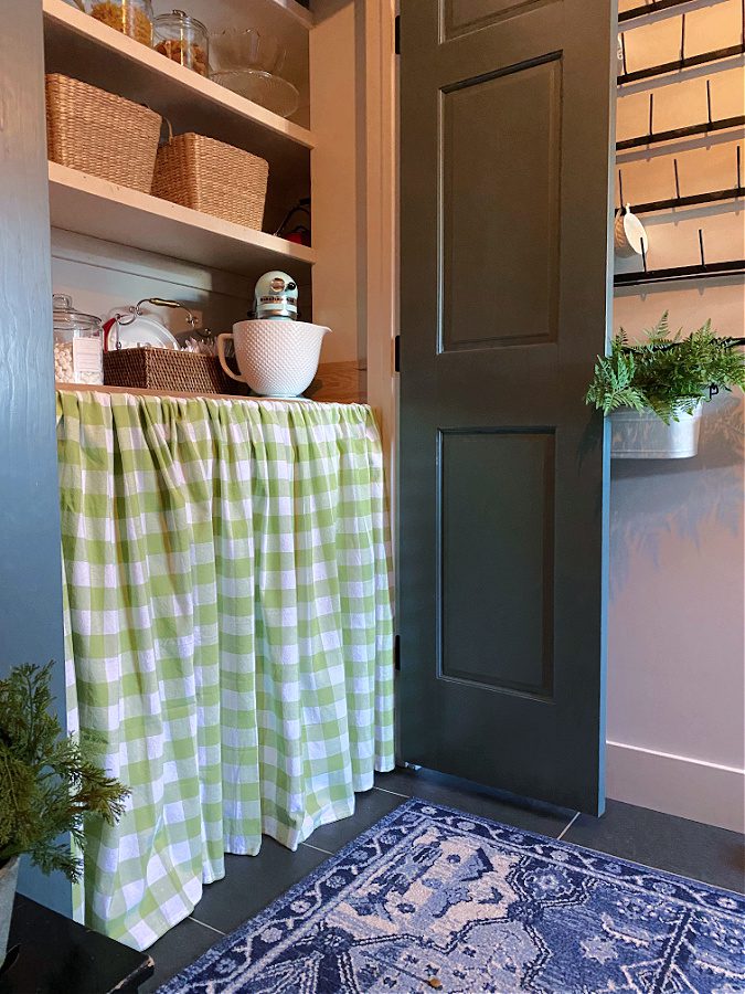 Green and white pantry curtain.