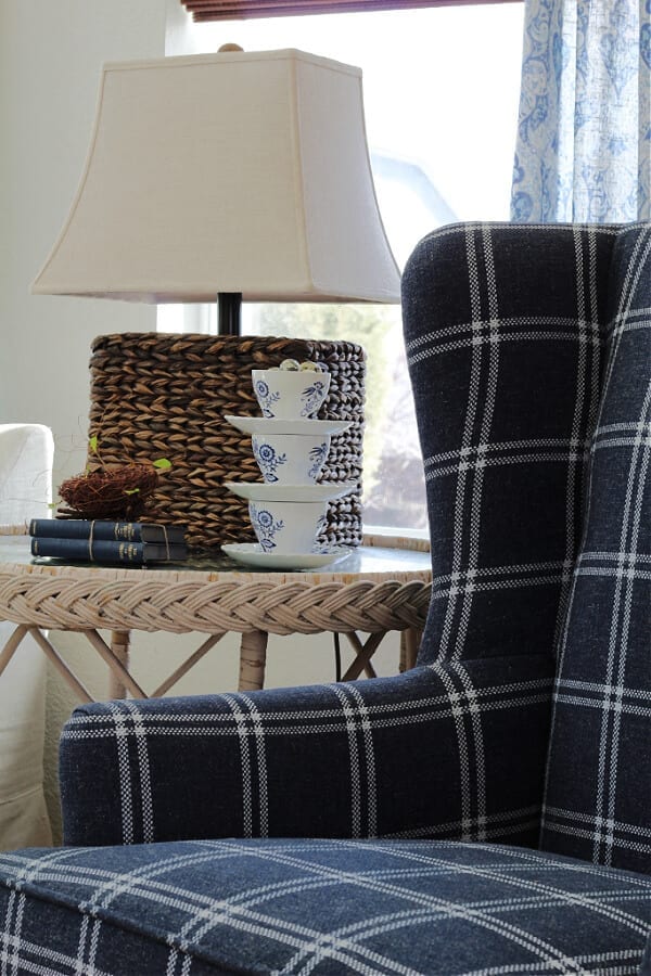 Polyester and plaid makes for the perfect combo on this wingback chair!